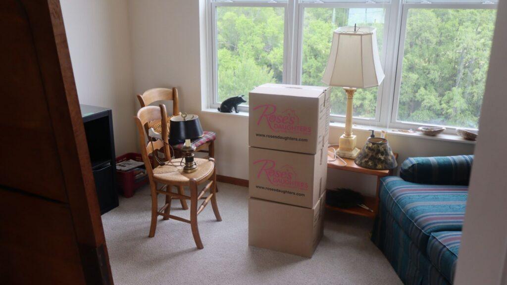 Labeled moving boxes prepared for a senior move