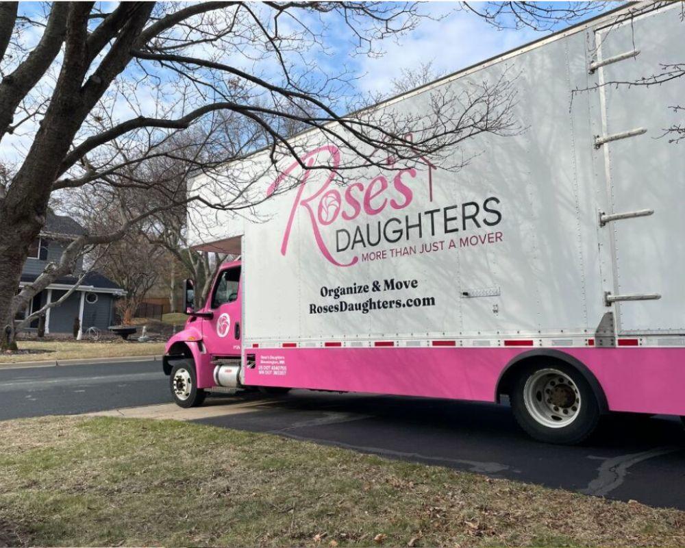 Rose's Daughters branded moving truck supporting event logistics